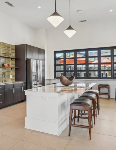 Modern Kitchen Featuring Island & Cabinetry